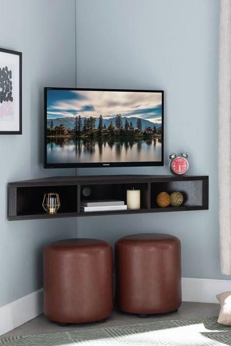 20 Floating Shelves Ideas, So You Can Create Extra Storage Space That Isn’t an Eyesore #purewow #organizing #home #decor #home picks Floating Corner Tv Stand, Corner Tv Ideas, Corner Tv Console, Wall Mounted Media Console, Corner Tv Stands, Ruang Tv, Corner Tv Unit, Small Condo, Floating Tv Stand