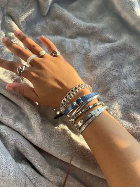 @Iwannag0t0plut0 Silver Rings Stacking, Silver Jewelry Girl, Good And Silver Jewelry Together, Silver Jewelry Bracelet Stack, Cool Girl Jewelry Silver, Chunky Silver Bracelets, Silver Jewelry Stack Bracelets, Silver Bangle Stack, Silver Bangles Aesthetic