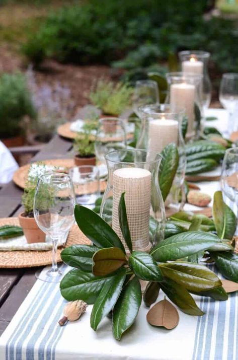 7 Magnolia Leaf DIY Projects To Get The Farmhouse Look Tropisk Fest, Outdoor Dinner Party, Outdoor Dinner Parties, Tafel Decor, Outdoor Dinner, Beautiful Table Settings, Magnolia Leaves, Fall Tablescapes, בר מצווה