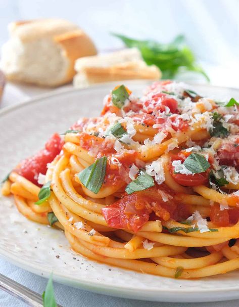 These 20 delicious recipes with canned tomatoes are the supreme example of how to make the most of this versatile, convenient pantry staple. #cannedtomatoes #cannedtomatoesrecipes #cannedtomatoesrecipesdinner Recipes With Canned Tomatoes, Sausage Pasta Recipes, Tomato Recipe, Canned Tomatoes, Pasta Dinner Recipes, Pasta Sauce Recipes, Sausage Pasta, Diced Tomatoes, Easy Pasta Recipes