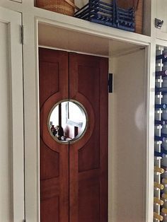 Nantucket House Tour bar door..porthole door to pantry. Swinging Door With Porthole, Swinging Doors Kitchen, Porthole Door, Restaurant Door, Charming Dining Room, Saloon Doors, Nantucket House, Bar Door, Nantucket Home