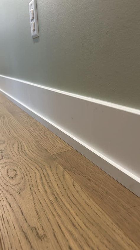 Large Trim Molding, Diy Modern Baseboards And Trim, How To Heighten Ceilings, Diy Trim Baseboards Cheap, Modern Floor Molding, Modern Wood Baseboards, Flatstock Trim, Base Molding Ideas Trim, Living Room Baseboard Ideas