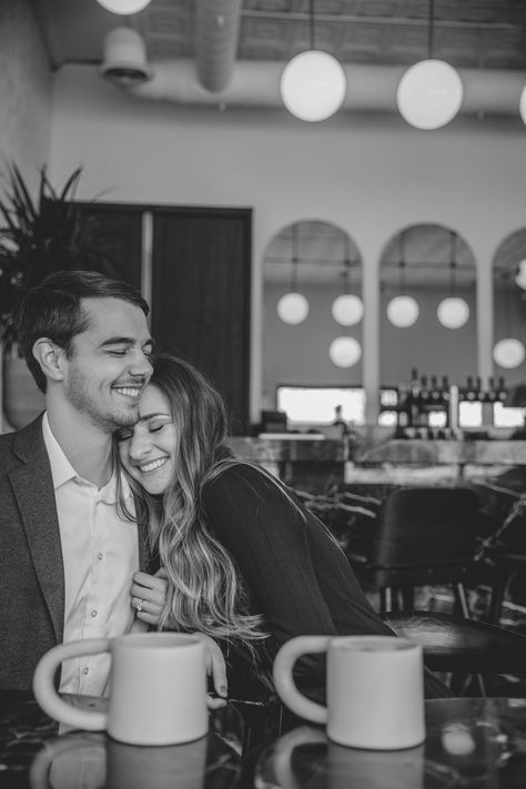 Couple Photos In Coffee Shop, Couple Photography Poses In Cafe, Coffee Shop Photo Shoot Couple, Cute Couple Photos In Cafe, Engagement Pictures Indoors, Coffee Engagement Shoot, Engagement Pictures Coffee Shop, Coffee Prenup Ideas, Smiling Engagement Pictures