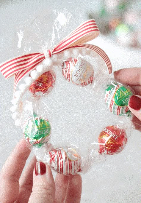 Ornaments Filled With Candy, Holiday Treats For Teachers, Cellophane Wrapping Ideas Christmas, Starburst Candy Ideas, Diy Holiday Candy Gifts, Candy Cane Gift Wrapping Ideas, Christmas Truffle Wreath, Candy Tubes Favors, Candy Filled Ornaments Diy