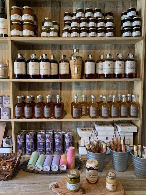 lavender, apothecary shelves, syrups, cocktail mixers, Small Apothecary Business, Apothecary Store Display, Apothecary Business Ideas, Apothecary Set Up, Old Apothecary Shop, Herbal Shop Aesthetic, Apocathary Aesthetic, Apothecary Shop Ideas, Natural Medicine Aesthetic