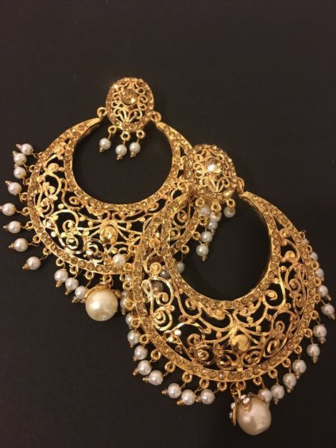 beautiful big size handcrafted gold plated Hyderabadi chandbali earrings. The earrings are embellished with stones and pearls to finish the look. Chand Bali Earrings Gold, Hyderabadi Jewellery, Handmade Necklace Designs, Hyderabadi Jewelry, Vintage Gold Earrings, Sabyasachi Jewellery, Gold Earrings Models, Bridal Jewellery Design, Indian Jewellery Design Earrings