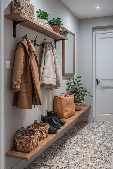 29 Tiny Apartment Entryway Ideas That Combine Function and Style 7 Entrance Hall Ideas Shoes, Open Shelving Entryway, Small Entrance Hall Storage Ideas, Tiny Hallway Storage Ideas, Small Entryway Ideas Raised Ranch, Small Coat Hook Area, Storage Small Entryway, Small Basement Entryway Ideas, Extra Small Entryway Ideas