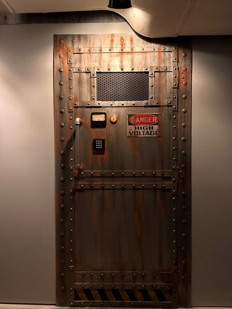 Doors made out of wood and faux finished to look like steel. Steampunk Door, Steampunk Rooms, Bourbon Room, Safe Door, Cast Iron Doorstop, Industrial Door, Silo House, Metal Doors Design, Garage Organization Diy