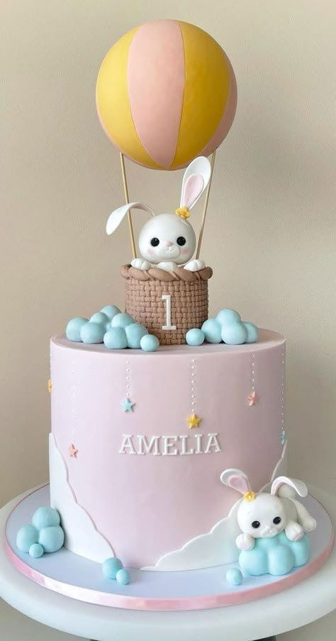 13. Cute bunny in hot air balloon cake Children’s parties are easy and fun to plan. All you have to do is to decide... Hot Balloon Cake, Baby Girl 1st Birthday Cake Ideas, Bunny Cakes Birthday Kids, Balloon Cake Ideas, Fondant Hot Air Balloon, Birthday Cake For First Birthday, Hot Air Balloon Birthday Cake, Cake With Bunny, Cake Hot Air Balloon