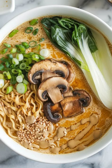 A photo of a  Vegan Sesame Ramen a Vegan Ramen Vegan Mushroom Ramen, Asian Meals Vegetarian, Korean Ramen Vegetarian, Ramen Broth Vegetarian, Gut Friendly Vegan Recipes, Veggie Miso Ramen, Ramen Soup Recipes Vegetarian, Ramen Recipes Vegan, Asian Soup Vegetarian