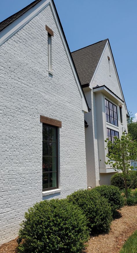 Gorgeous white brick home exterior painted with Keim Mineral Masonry paint. Textured Brick Exterior, Painted Brick Exterior House, Painted Stone House Exterior, Brick And Stucco Exterior Houses, Stucco Over Brick, Paint Exterior Brick, Romabio Masonry Flat, Paint Brick House, Brick Exterior Ideas