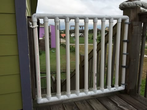 PVC gate for the deck built with my brother!  Conduit straps for the hinges and a crocheted rope for the latch. Pvc Dog Gate, Pvc Gates And Fences, Pvc Gate, Pvc Pipe Ideas, Diy Gate, Pipe Fence, Diy Baby Gate, Pvc Furniture, Pvc Fence