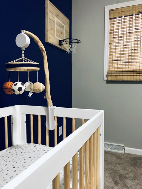 Baby Boy Sports Nursery Room Ideas, Sporty Nursery Ideas, Sneaker Themed Nursery, Modern Sports Nursery, Sport Nursery Ideas Boy, Boy Nursery Ideas Sports, Neutral Sports Nursery, Basketball Themed Nursery, Sports Baby Nursery