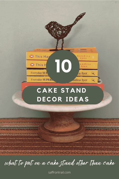 Cake stand decor ideas How To Decorate With A Cake Stand, Table Centerpiece Using Cake Stands, Cake Stand Table Centerpiece, Decorate Cake Stand Ideas, Covered Cake Plate Decor Display, Marble Cake Stand Decor, Cake Pedestal Decor Ideas, Decorating A Cake Stand, Cake Plate Centerpiece Ideas