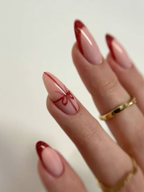 22 Trendy Red French Tip Nails to Keep Your Winter Look Fresh | Everygirl Edit Red Winter Nails Almond, French Tip Nails Gel Almond, Christmas Nails Aesthetic Red, Winter Nail Almond, Red Christmas Nail Designs 2024, Red Nail French Tips, French Tip Xmas Nails, French Red Tip Nails, Christmas Nails Minimalist