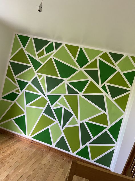 Green triangle wall painted on bots bedroom Painted Triangles On Wall, Paint Triangles On Wall, Painted Triangle Accent Wall, Painting Triangles On Wall, Easy Geometric Wall Painting, Green Triangle Wall Paint, Geometric Green Wall, Geometric Pattern Wall Paint, Triangle Design On Wall