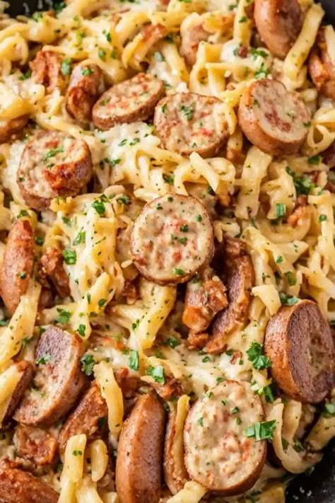 Smoked Sausage Cajun Alfredo Recipe

Ingredients

- 8 ounces fettuccine pasta
- 1 tablespoon olive oil
- 12 ounces smoked sausage, sliced
- 1 cup heavy cream
- 1 cup grated Parmesan cheese
- 1 tablespoon Cajun seasoning
- 1/2 teaspoon garlic powder
- Salt and pepper to taste
- Chopped parsley for garnish

Full Cooking Instructions on... Smoked Sausage Cajun Alfredo, Cajun Sausage Recipe, Beef Smoked Sausage Recipe, Cajun Alfredo Recipe, Sausage Pasta Dinner, Smoked Sausage Recipes Pasta, Cajun Pasta Recipes, Cajun Alfredo, Cajun Sausage Pasta