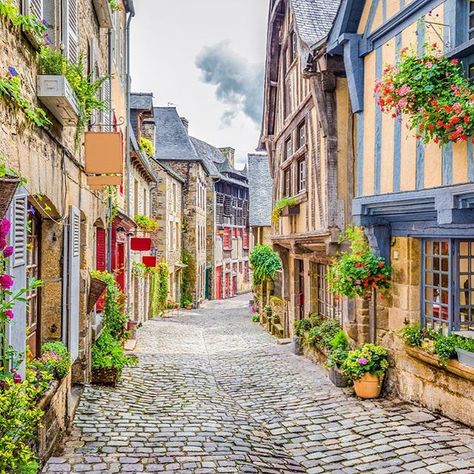 A scenic narrow alley with historic traditional houses and cobbled street in an old town in Europe.⠀ Western Region, Visit France, Beaux Villages, Medieval Town, Old City, Background For Photography, Lonely Planet, Banksy, Of Wallpaper