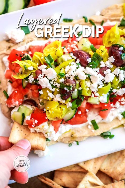 This is THE BEST DIP RECIPE EVER! This easy layered greek dip is quick to make, requires no cooking, and people rave about it every time it is served. It is kind of like a seven layer greek dip where all of the ingredients are layered on top of each other to form a fresh, healthy party dip perfect for an appetizer or neighborhood BBQ. Serve this easy greek layer dip with fresh pita or chips. Layered Greek Dip, Greek Hummus Dip, Greek Dip Recipes, Greek Layer Dip, Layered Dip, Greek Dip, Best Dip Recipes, Layered Dip Recipes, Best Dip