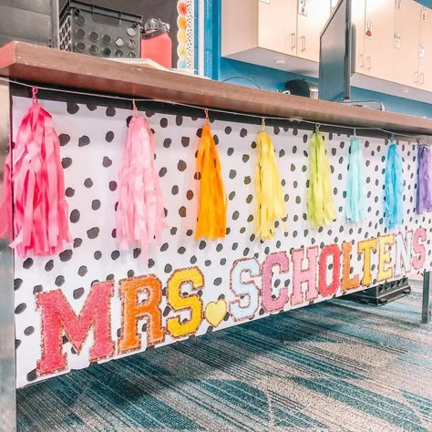 Teacher Desk Name Banner, Teacher Desk Garland, Classroom Cricut Decor, You Are Loved Classroom Decor, Stony Clover Classroom, Bright Classroom Themes Elementary, Classroom Cork Board, Cricket Classroom Ideas, How To Decorate A Preschool Classroom