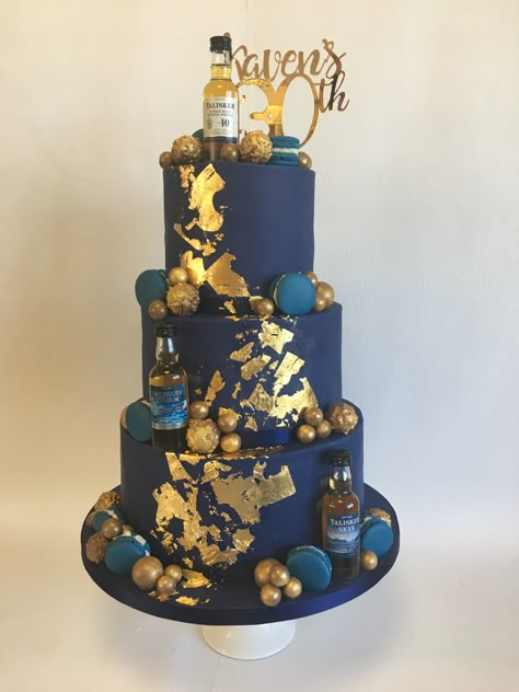 3 tier Navy 30th birthday cake with edible gold leaf, macarons and gold chocolate decorations Navy Blue And Gold Birthday Cake For Men, 40th Birthday Ideas For Men Blue And Gold, 3 Tier Cake For Men, Navy Blue And Gold Cake For Men, 18th Birthday Cake 3 Tier, 3tier Birthday Cake, Navy And Gold Birthday Cake, Navy Blue And Gold Birthday Decorations, Navy Gold Cake