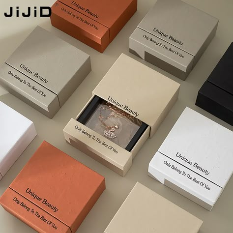 JiJiD Hot Sale Drawer Jewel Ring Earring Bracelet Packaging White Black Custom Logo Jewelry Box https://m.alibaba.com/product/1600696191886/JiJiD-Hot-Sale-Drawer-Jewel-Ring.html?__sceneInfo={"cacheTime":"1800000","type":"appDetailShare"} Custom Jewelry Packaging, Plain Jewelry, Jewelry Packaging Design, Unique Beauty Products, Bracelet Packaging, Packaging Jewelry, Modern Packaging, Jewelry Display Box, Logo Jewelry