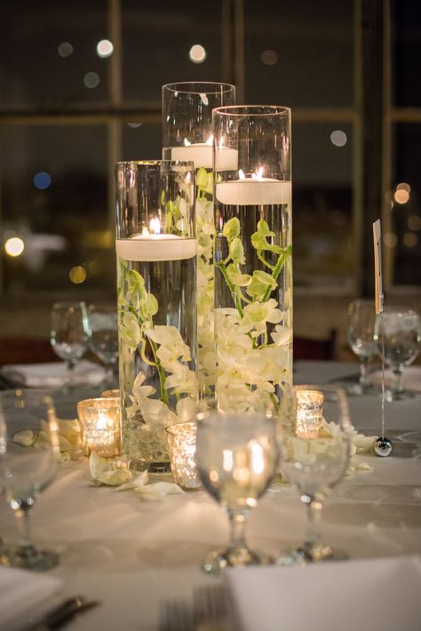 White Orchid Centerpiece, Budget Friendly Wedding Centerpieces, Submerged Flowers, Water Centerpieces, Floating Candles Wedding, Beautiful Wedding Centerpiece, Floating Candle Centerpieces, Elegant Wedding Centerpiece, Orchid Centerpieces