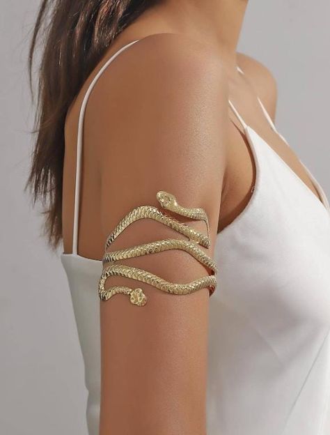 📍PRODUCT SIZE Diameter: 8.4 cm Diameter: 3.3 inch 📍PRODUCT FEATURES Color: Yellow Gold Material:Zinc Alloy Type: Snake Design Arm Cuff Style: Fashionable ✈ PROCESSING TIMES All orders are shipped within 1-2 business days after order is received. 📍TRANSPORT İncludes tracking number 📞COMMUNICATION We recommend that you add your phone number in order not to encounter any problems during the delivery of the cargo. 💫 Thank you for choosing our store. Snake Inspired Fashion, Upper Arm Cuff Bracelet, Gold Arm Cuff, Upper Arm Cuff, Arm Bangles, Gold Arm Band, Arm Cuff Bracelet, Upper Arm Cuffs, Open Bangle Bracelet