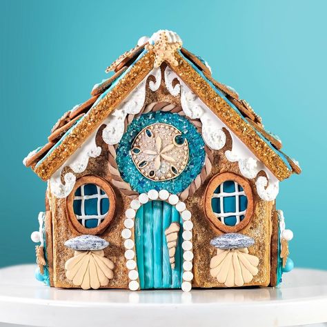 My friends over at @bakerybling sent me their Winter Wonderland Designer Gingerbread House kit along with a selection of beautiful blingy… | Instagram Gingerbread House Ideas Beach Theme, Blue Gingerbread House Ideas, Coastal Gingerbread House, Under The Sea Gingerbread House, Beachy Gingerbread House, Beach Themed Gingerbread House, Beach House Gingerbread House, Winter Wonderland Gingerbread House, Gingerbread House Beach