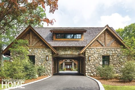 The driveway leads through a combined garage and guesthouse in the manner of a dogtrot, ending in a courtyard formed by the main house and its garages. House With Bridge To Garage, End Of Driveway Ideas Entrance, Adirondack Lodge, Garage Pictures, New England Farmhouse, Adirondack Style, New England Home, Porte Cochere, Exclamation Point