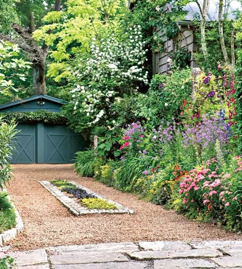 Add flowerbeds or planting to soften the look of your driveway. More curb appeal on a dime: http://www.bhg.com/home-improvement/exteriors/curb-appeal/curb-appeal-on-a-dime/?socsrc=bhgpin081613driveway=14 Small Parking Area Ideas, Natural Driveway, Cottage Driveway, Rustic Garage, Small Ornamental Trees, Garden Driveway, Curb Appeal Landscape, Driveway Ideas, Driveway Design