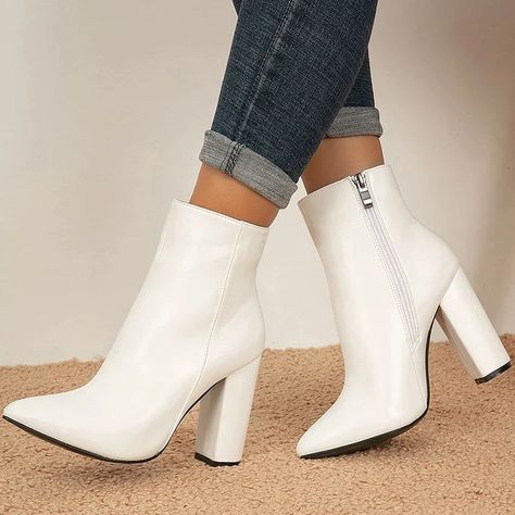 Whether you prefer ankle boots, knee-highs, or over-the-knee styles, there's a pair that will suit your needs. White Ankle-high Heeled Boots For Formal Occasions, White High Heel Mid-calf Trendy Boots, White Ankle Boots Outfit, Ankle Boots Outfit Fall, White Ankle-high Heeled Boots With Padded Ankle, White Mid-calf Boots With Stacked Heel And Pointed Toe, White Boots With Sculpted Heel, Medium Width, Trending Heels, White Ankle Boots