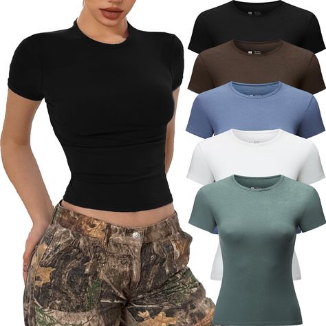 PRICES MAY VARY. High-quality: Crafted from a luxuriously soft and skin-friendly fabric, our basic tops for woman offer a second-skin feel. 5 piece Y2k shirts are made of 90% polyester and 10% spandex. High quality elastic fabric,light weight, super soft and skin-friendly, make you more comfortable to wear. Timeless Crop Tops Design: Discover the charm of our short sleeve t shirts - Going Out Crop Tops for women, Sexy shirts, slim fit crop tops, short sleeve, crew neck, solid color, plain unders Under Shirt Women, Clothes For Women Y2k, Plain Tops For Women, Tight Tops For Women, Amazon Shirts Women, Cute Fitted Tops, Basic Tees Women, Tight Shirts For Women, Plain Shirts Women