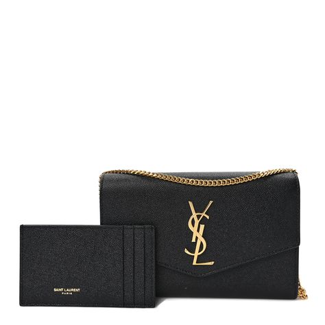 This is an authentic SAINT LAURENT Grain De Poudre Uptown Chain Wallet in Black. This tote is crafted of pebbled calfskin leather in black. The bag features an optional polished gold chain strap and a matching gold YSL monogram detail on the crossover flap. The bag opens to a black leather interior with a pocket. Bag Insert, Chain Wallet, Wallet Chain, Leather Interior, Chain Strap, Gold Chain, Crossover, Gold Chains, Patch Pocket