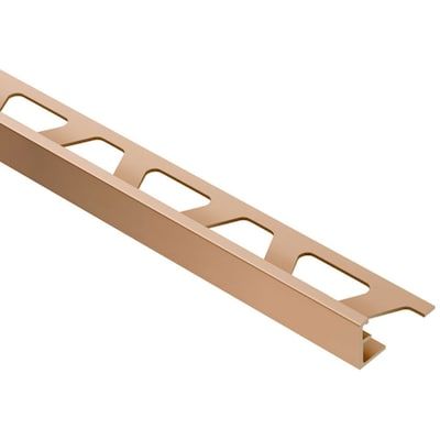 Shop Schluter Systems Schiene 0.5-in W x 98.5-in L Satin Copper Anodized Aluminum L-angle Tile Edge Trimundefined at Lowe's.com. Schiene is designed to finish tile edges on floors. It features an 87-degree angle to transfer point loads and protect tile edges from chipping. Schiene is Tile Edge Trim, Bathtub Surround, Copper Tiles, Tile Edge, Metal Tile, Tile Trim, Straight Edges, Anodized Aluminum, Copper Finish