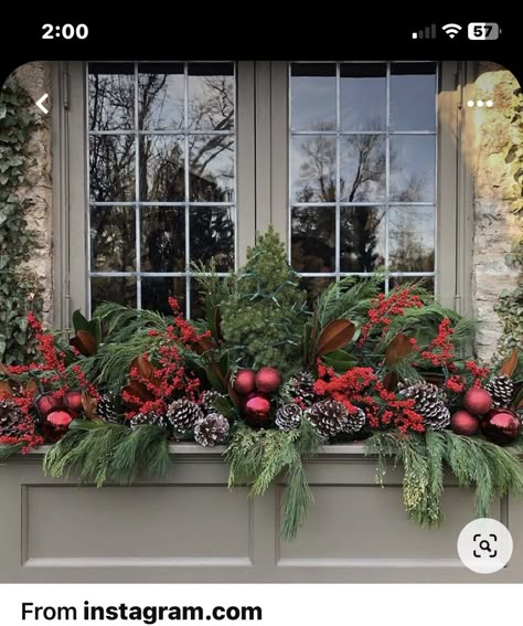 Window Planter Christmas Decor, Christmas Window Box Decorations, Holiday Outdoor Planters, Window Box Christmas Decor, Christmas Planter Boxes, Winter Flower Boxes Window, Porch Window Christmas Decor, Christmas Flower Boxes Outdoor, Decorating For Christmas Outdoors