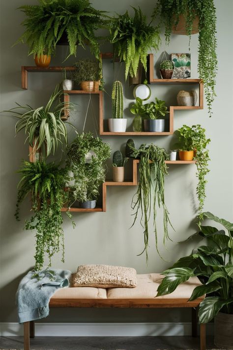 Transform your home into a verdant sanctuary with a living wall. Use staggered shelves and a mix of greenery to create a relaxing and stylish bohemian vibe. #LivingWallDesign #BohoGreenery #PlantWallIdeas #HomeDecorTrends #WoodenShelves #IndoorJungle #EcoFriendlyDecor #FernsAndCacti #GreenInteriorStyle #BohemianLiving Plant Boho Aesthetic, Plant Decor Living Room Wall Shelves, Hanging Plants Shelves, Flower Shelf Wall, Plants And Shelves, Plant Shelf Small Space, In House Plants Decor, Plant Aesthetic Interior Design, Wood Plant Wall Decor