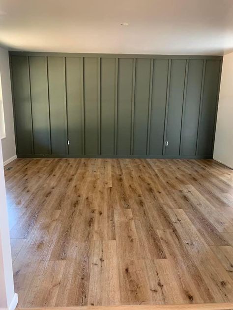 Guest Bedroom Green Accent Wall, Update Wood Paneling Walls, Neutral Green Walls, Wood Design Wall Decor, Green Wall Behind Fireplace, Light Grey With Dark Grey Accent Wall, Home Office Dark Green Accent Wall, Wood Paneling Painted Green, White Room Green Accent Wall