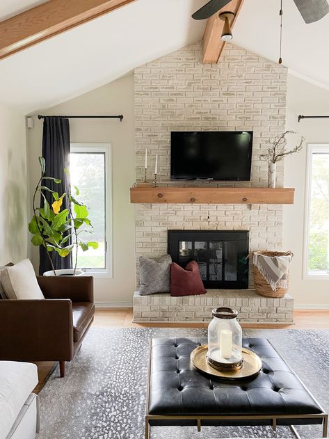 Bright Airy Living Room, Moody Christmas Decor, Fireplace With Tv, White Wash Brick Fireplace, Airy Living Room, Moody Christmas, Red Brick Fireplaces, Tv Mounted, Painted Brick Fireplace