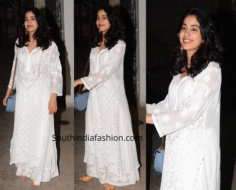 While out and about, Janhvi was snapped in a white chikankari kurta paired with matching skirt. She carried a denim Louis Vuitton crossbody bag and finished off her look with a pair of gold earrings and multi-colored juttis! Kurta With Jeans, White Chikankari Kurta, Indian Kurti Designs, Chikankari Kurta, Janhvi Kapoor, Jeans Outfit Women, Casual Indian Fashion, Bollywood Outfits, Traditional Indian Outfits