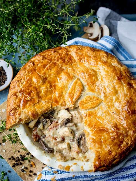 My chicken and mushroom pie is proper comfort food. Encased in buttery puff pastry, and made extra special with a sprinkling of bacon, it's a family mealtime favourite. #chickenpie #pieweek #comfortfood #winterfood #whoateallthepies #mushrooms #puffpastry #familydinner #nationalpieweek #britishpieweek Chicken Pot Pie With Mushrooms, Chicken And Mushroom Pie Recipe, Pastry Chicken Recipes, Chicken Pie Recipes, Chicken And Mushroom Pie, Chicken Pie Recipe, Bacon Mushroom, Savoury Pies, Mushroom Pie