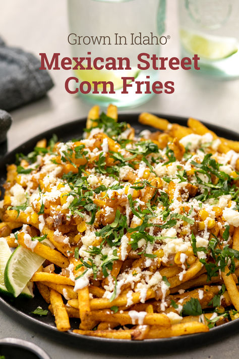 Looking for a delicious, approachable meal for your next get together? Look no further than these spicy Mexican Street Corn Fries. Grown In Idaho® Shoestring Fries are loaded with corn, onion, Cotija cheese, sour cream, lime, and cilantro for a burst of flavor in every bite. Side For Street Tacos, Mexican Street Corn Fries, Summer Italian Recipes Dinners, Street Corn Fries, Hot Day Meals, Corn Fries, Street Fries, Shoestring Fries, Bakes Recipe