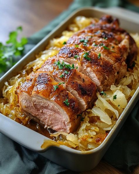 Delicious Oven Roasted Pork Loin with Sauerkraut Recipe Pork Loin Roast Oven Recipes, German Pork Loin Roast Recipes, Slow Roast Pork Loin Oven, Pork Roast And Sour Kraut Recipes, Pork Tenderloin With Sauerkraut Crockpot, Pork Roast With Sauerkraut In Oven, Aip Pork Loin Recipes, Roast Pork And Sauerkraut Recipe, Roasted Pork And Sauerkraut