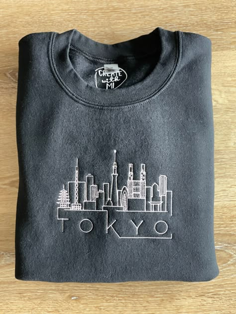 Shop now for your custom skyline embroidered sweatshirt! This cozy sweatshirt is perfect for layering and will keep you warm all winter long. Choose from a variety of colors and styles to find the perfect one for you. #sweatshirt #embroidery . #Embroidery_Design_Shirt #City_Shirt_Design #Embroidery_Designs_For_Hoodie #College_Embroidered_Sweatshirts City Shirt Design, Embroidery Designs For Hoodie, College Embroidered Sweatshirts, Embroidered Sweatshirt Outfit, Embroidered Shirt Ideas, Embroidery Designs Sweatshirt, Taylor Embroidery, City Embroidery, Crewneck Embroidery