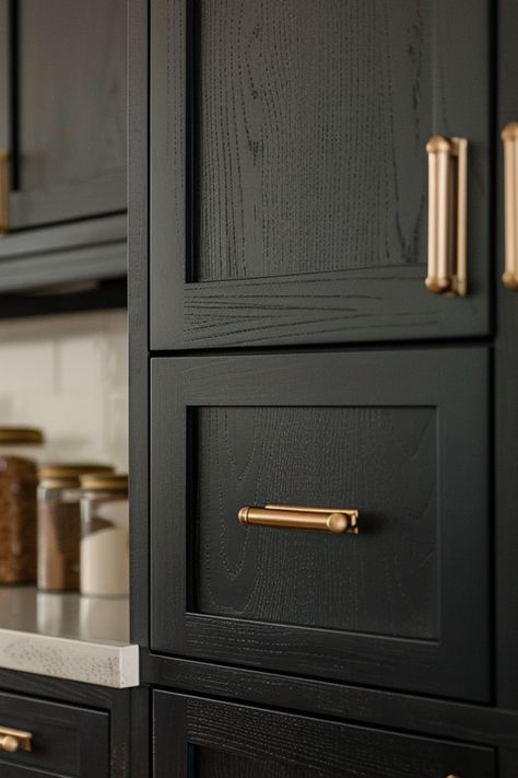 Uncover a world of possibilities with 50+ stunning ideas for modern farmhouse black kitchen cabinets, adding a touch of timeless elegance to your home decor. Black Painted Oak Kitchen Cabinets, Black Transitional Kitchen, Black Cabinet Farmhouse Kitchen, Black Cabinets With Bronze Hardware, Organic Modern Black Kitchen, Modern Mountain Kitchen Cabinets, Black Cabinet Gold Hardware, Black Stained Cabinets Kitchen, Black Farmhouse Kitchen Cabinets