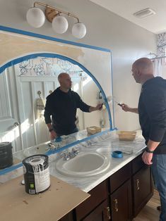 Bathroom Update (DIY Arched Mirror Hack and Lots More!) Diy Arched Mirror, Round Mirror Decor Ideas, Update Bathroom Mirror, Bathroom Update Diy, Arch Mirror Bathroom, Bathroom Mirror Makeover, Kitchen Sink Decor, Mirror Hack, Large Bathroom Mirrors