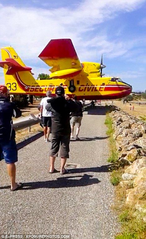 Pyrenees water-bombing plane flies past just feet above the ground and pedestrians heads | Daily Mail Online Supersonic Aircraft, Firefighter Pictures, Float Plane, Water Rescue, Flying Vehicles, Cool Fire, Flying Boat, Tunbridge Wells, Aircraft Pictures