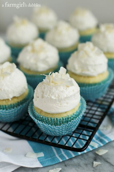 Coconut Cupcakes with Fluffy Coconut Buttercream from afarmgirlsdabbles.com Coconut Cupcake Recipes, Coconut Cupcake, Frost Cupcakes, Coconut Buttercream, Coconut Cupcakes, Buttercream Recipe, Cupcake Recipe, Coconut Cake, Savoury Cake