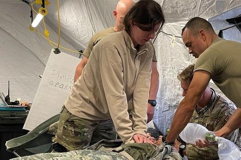 920th Aeromedical Staging Squadron and 315th Aeromedical Evacuation Squadron airmen conduct cardiac arrest training during exercise Distant Horizon at Bradshaw Army Airfield, Hawaii, Aug. 3, 2022. (Staff Sgt. Darius Sostre-Miroir/U.S. Air Force photo) Bicuspid Aortic Valve, Enlarged Heart, Cardiac Rhythms, Air Force Photo, Army Nurse, Congenital Heart Defect, Basketball Practice, Air Force Academy, Staff Sergeant