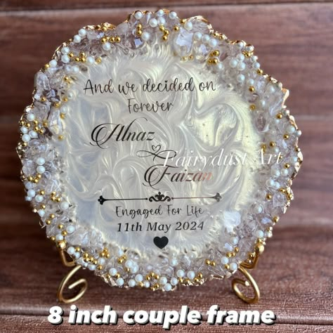 Couple frames are a trendy and aesthetic gift to decorate the room . Dm to order yours @fairydustart_16 . [ couple gift, couple gifts, anniversary gift, anniversary gifts, wedding gift, wedding gifts, anniversary gift] Couple Gifts For Both Anniversary, Resin Art For Anniversary Gift, Resin Frames For Couples, Resin Art Wedding Gift, Engagement Anniversary Gift Ideas, Resin Frame Ideas, Resin Art Business, Engagement Gift Ideas For Couples, Raisin Art